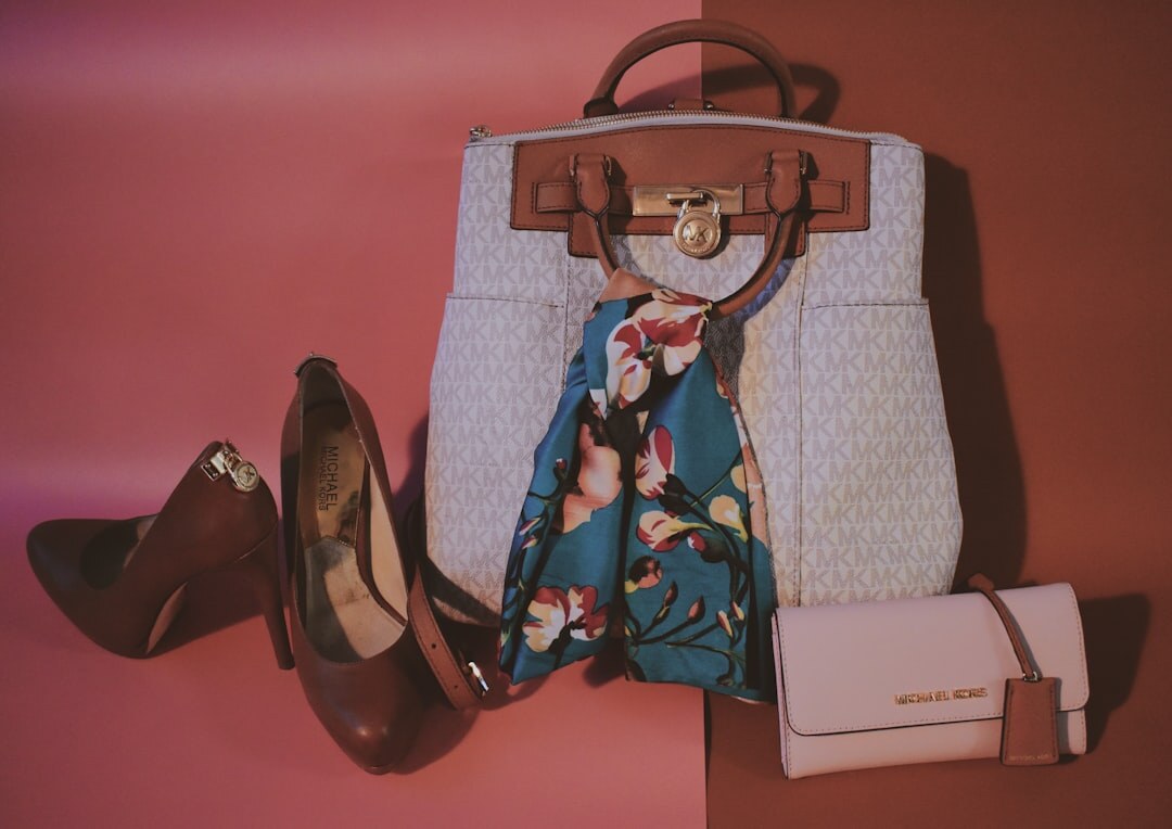 Designer fashion accessories flatlay with heels, sunglasses and jewelry
