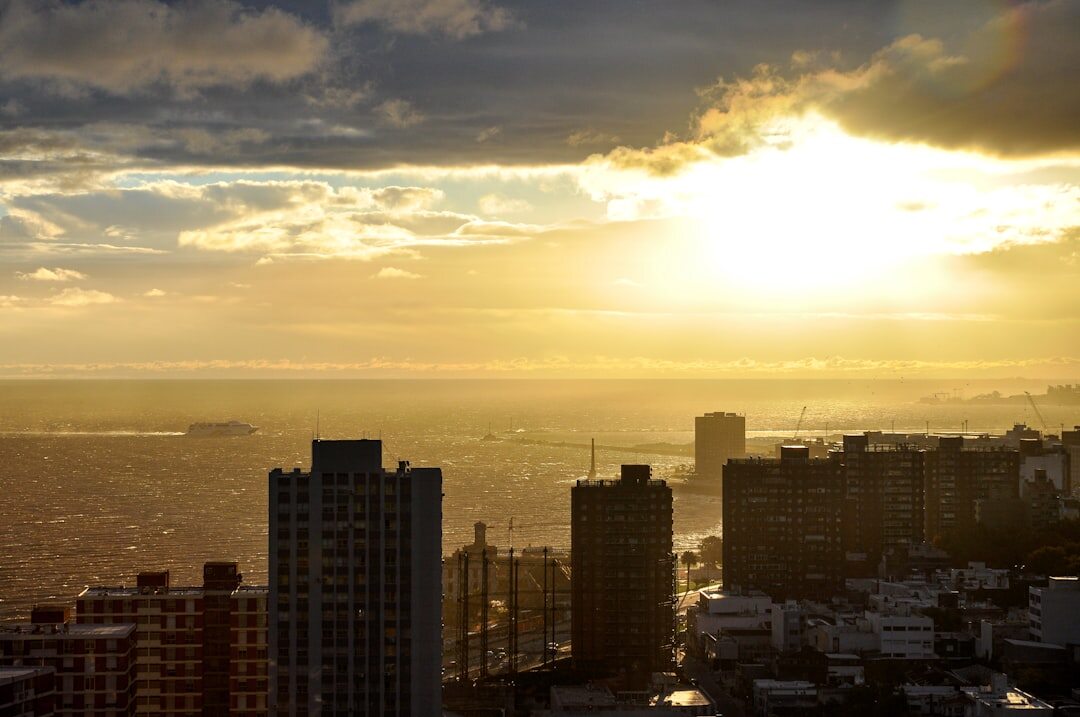 Montevideo Rambla coastline skyline at golden sunset